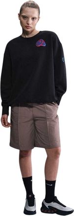 Nike Phoenix Engeland fleece-sweatshirt met ronde hals voor dames (Zwart/Paars)