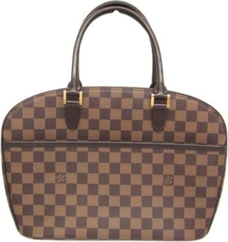 Louis Vuitton Pre-owned Handbags, female, Brown, Size: ONE SIZE Pre-owned Sarria Horizontal N51282