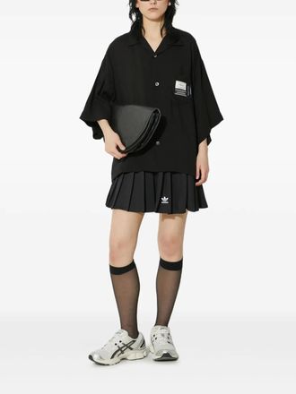 Undercover pocket-detail short-sleeve shirt - women - Polyester - S - Black