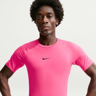 Nike Mens Nike Pro Dri-FIT Tight Short-Sleeve Fitness Top in Pink | FB7932-646