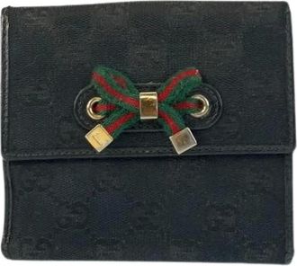 Gucci Pre-owned Wallets, female, Black, Size: ONE SIZE Pre-owned GG Canvas Leather Wallet