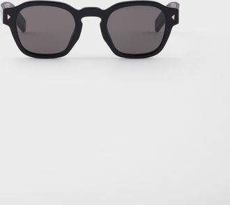 Prada Sunglasses with the iconic metal plaque