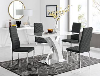 Furniturebox Atlanta White High Gloss & Chrome 4 Seater Dining Table with X Shaped Legs & 4 Faux Leather Milan Chairs in Black