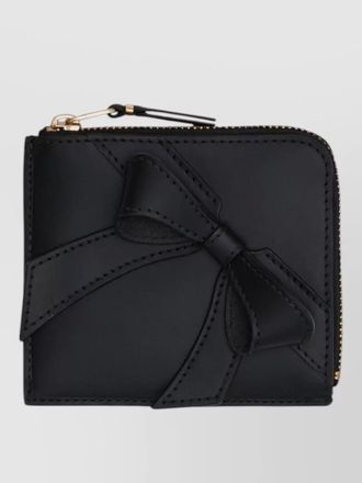 Comme Des Garçons chic purses and cardholders with bow detail