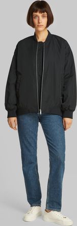 Calvin Klein Jeans Bomberjacke »LONG BOMBER« mit Logodruck, Rumpfabschluss verengt durch Gummizug