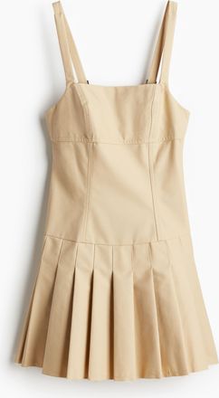 H&M Kleid mit tiefem Rückenausschnitt und Plisseejupe - Beige