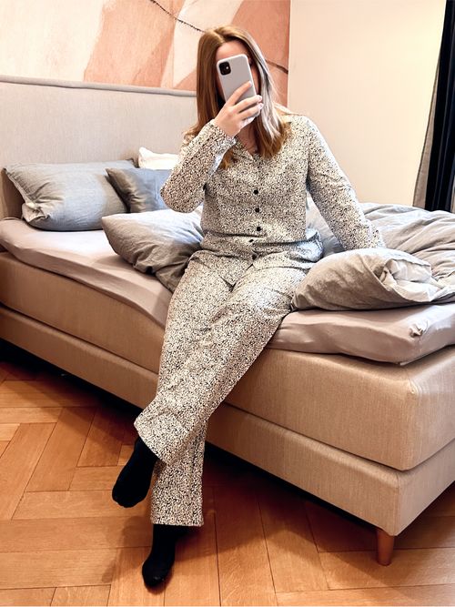 Our style editor wears a leopard printed pajama set from Amazon