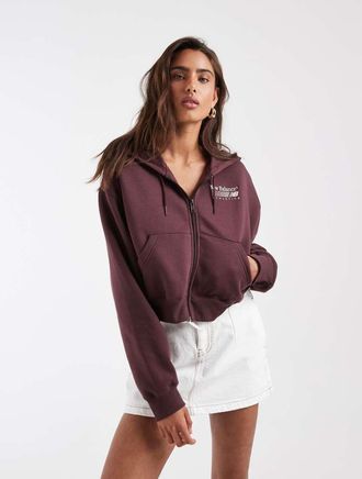 New Balance Trackside - Felpa con cappuccio e zip marrone