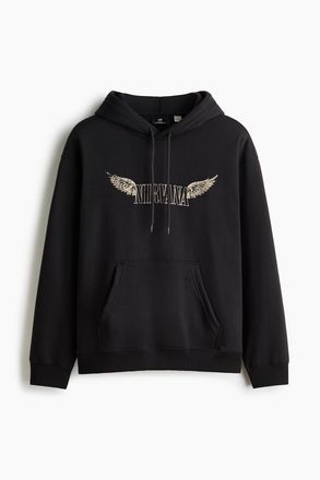 H&M Bedruckter Hoodie in Loose Fit - Schwarz