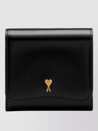 Ami compact wallet featuring gold tone hardware
