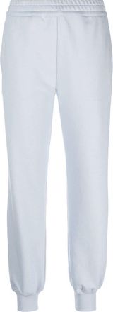 Alexander McQueen logo-print track pants - women - Cotton/Cotton - 44 - Blue