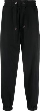 Balmain Fluid cotton track pants - men - CALFSKIN/Lyocell/Cotton - 48 - Black