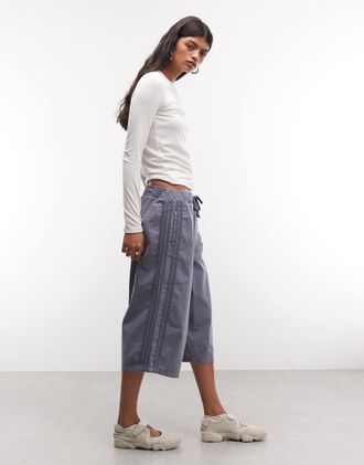 Collusion shorts da tuta baggy in denim lavaggio blu medio