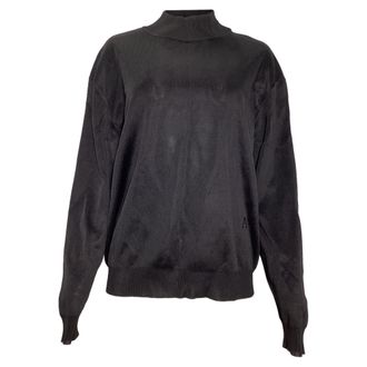 Alaia Embroidered Logo Mock Neck Sweater in Black Viscose