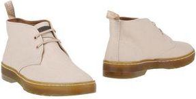 Dr. Martens CALZATURE - Stivaletti su YOOX.COM