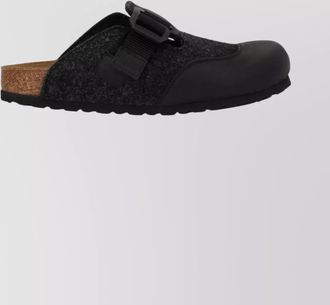 Birkenstock open back sandals featuring buckle detail