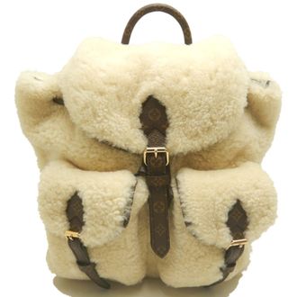 Louis Vuitton Cream Leather Backpack (Pre-Owned)