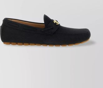 Valentino Garavani fastaway driver loafers with rubber sole and textured finish