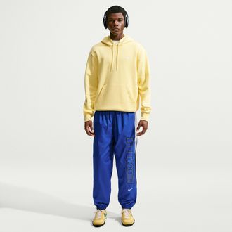 Nike Mens Nike Sportswear Windrunner Lined Pants in Blue | IV4853-417