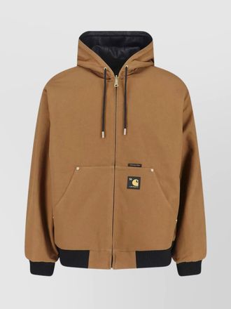 Carhartt Work in Progress versatile hooded jacket featuring pockets