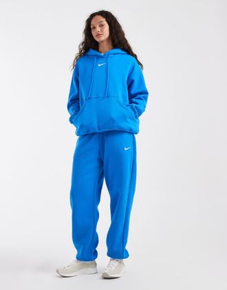 Nike Phoenix Fleece - Joggers oversize a vita alta blu con polsino
