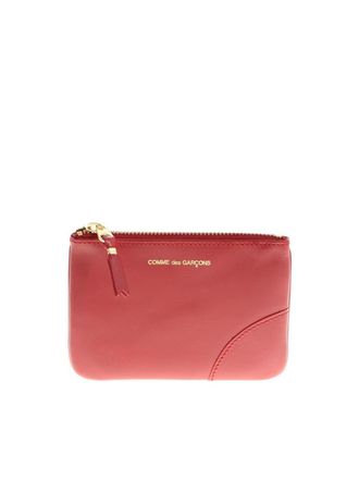 Comme Des Gar&ccedil;ons Logo print leather clutch
