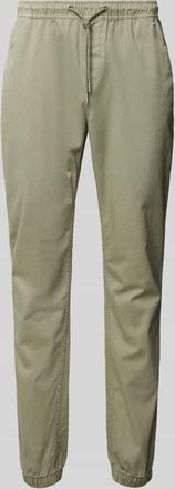 Tommy Jeans Tapered Fit Jogpants mit Tunnelzug Modell AUSTIN in Oliv, Größe 34/34