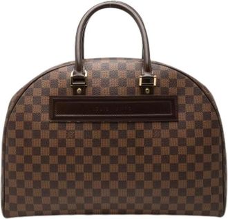 Louis Vuitton Pre-owned Nolita 24 H - Dames - Vintage Weekendtas - Bruin - ONE Size - Leer - Vintage