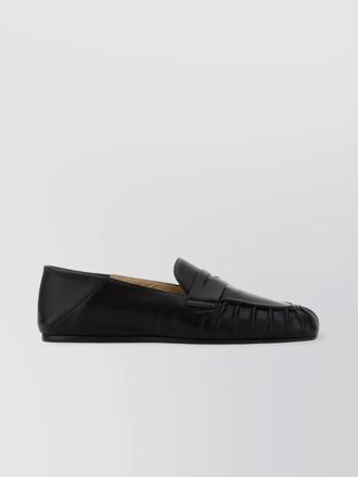 Stuart Weitzman leather loafers with round toe and ruched detailing