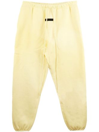 Fear of God Essentials logo-appliqué track pants - Yellow