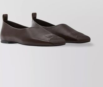 Courrèges nappa leather loafers embossed detail