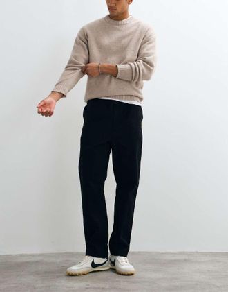 Carhartt Work in Progress Flint pantaloni regular tapered fit neri-Nero