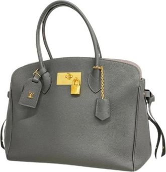 Louis Vuitton Pre-owned Handbags, female, Gray, Size: ONE SIZE Pre-owned Mila MM Handbag