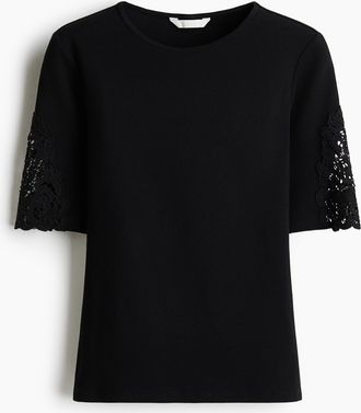 H&M Geripptes Shirt mit Spitze - Schwarz