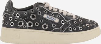 Autry su&egrave;de sneakers met metalen oogjes