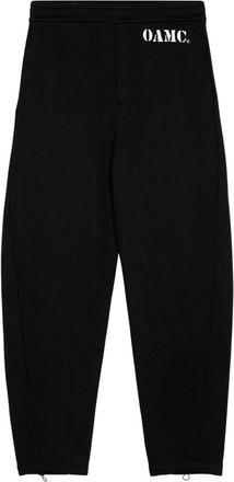 OAMC Geo organic cotton track pants - men - Organic Cotton - S - Black