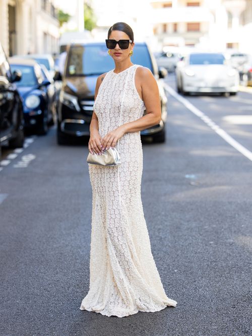 Gili Biegun wears silver Bottega Veneta bag, laced sleeveless dress during the 77th Cannes Film Festival on May 22, 2024 in Cannes, France.