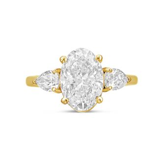 Diana M. Jewels 18kt yellow gold lab grown 6ct oval diamond ring with pears on the sides