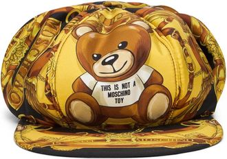 Moschino Hoed met klep en print - Dames - Hoeden - Geel - ONE Size - Accessoires