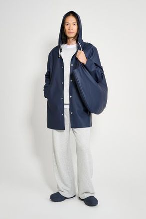 Stutterheim Stockholm Long Sleeve Hooded Raincoat in Navy at Nordstrom, Size X-Large