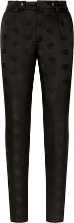 Dolce & Gabbana monogram-jacquard tapered-leg trousers - men - Polyamide - 48 - Black