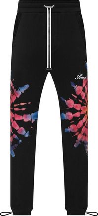 Amiri tie-dye-print track pants - men - Cotton - XXXL - Black