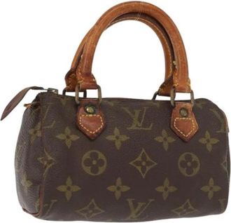 Louis Vuitton Pre-owned Mini Bags, female, Brown, Size: ONE SIZE Pre-owned Canvas Mini Bag