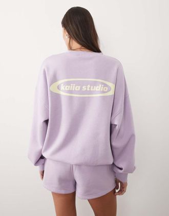KAIIA Studio - Felpa oversize in misto cotone lilla e limone con logo stampato in coordinato-Viola