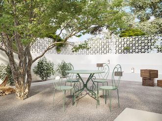 Vente-Unique Set da pranzo da giardino in metallo effetto ferro battuto: un tavolo D.120cm e 4 sedie impilabili - Verde acqua - GUERMANTES di MYLIA