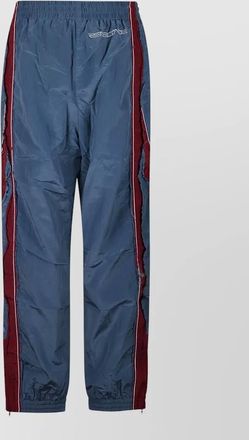 Martine Rose stretch trousers with stripe and panels