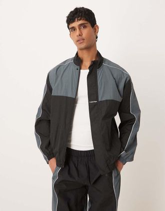 Calvin Klein Performance - Giacca colorblock nera e grigia in coordinato-Nero