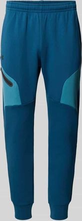 Under Armour Regular Fit Sweatpants mit Logo-Print Modell Unstoppable in Blau, Gr&ouml;&szlig;e XXL