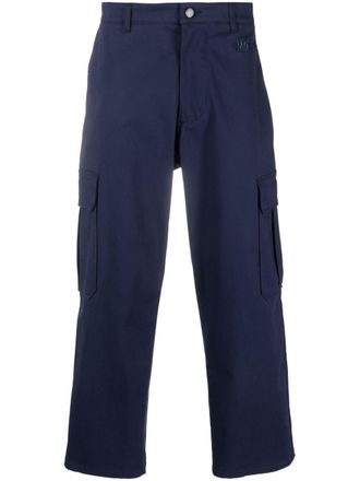 Moschino logo-embroidered cotton cropped trousers - men - Cotton/Elastane - 46 - Blue