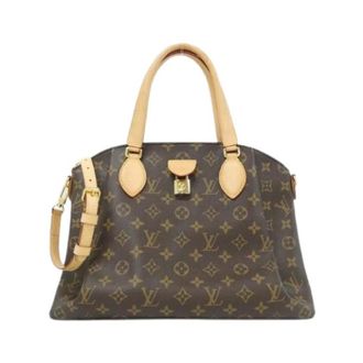 Louis Vuitton Pre-owned Rivoli Monogram Schoudertas - Dames - Pre-owned - Bruin - Maat: ONE Size